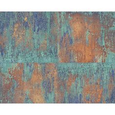 an old rusted metal surface with blue, orange and green paint on the edges