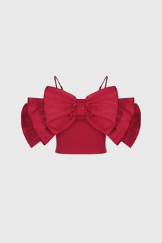 This Bow Top is perfect for formal occasions. With a large bow at the front and thin adjustable straps, it is designed to provide a slim fit that flatters your shape. Its stylish and versatile design will complete any outfit.Fabric: Cotton, Polyester Tops With Bows, Kpop Clothes, Bow Aesthetic, Ribbon Top, Resort Look, 3d Fashion, Black Tie Gala, Bow Top, Abstract Floral Print