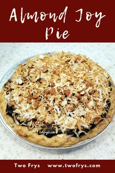 there is a pie with toppings on it and the words, almond joy pie