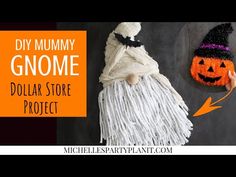 the diy mommy gnomee dollar store project is made with yarn and tassels