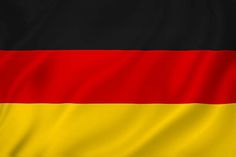 the flag of germany is waving in the wind with its colors red, yellow and black