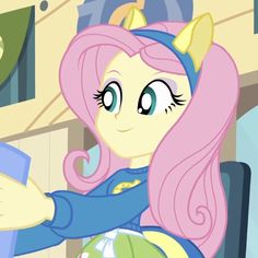 the pinkie is holding a cup in her hand