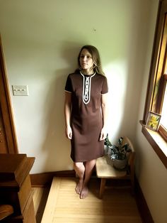 Up for sale is a vintage 1960's to 1970's brown and white mid-century style dress in an estimated small to medium. Overall the garment is in good condition with no major rips or tears. I did not a darker stain on the back bottom of the dress, approximately 3x3 inches--it is quite faded and does blend in though still present and able to notice.  No stains were noted on the front of the dress or elsewhere. Jerrie Lurie Estimated size: s to m Model is 5'5 125lbs and wears a small Measured flat (inc Century Dress, Dark Stains, Mid Century Style, Dress Clothes For Women, Style Dress, 1970s, 1960s, The Dress, Overalls