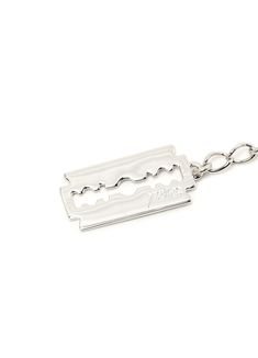 a metal keychain with a razor blade on it's side and a chain attached to it