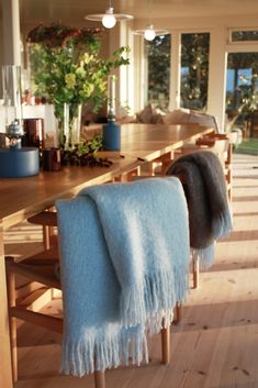 a table with two blankets on it in a room