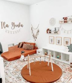 a living room filled with lots of furniture and decor on top of a carpeted floor