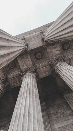 the top of an old building with columns