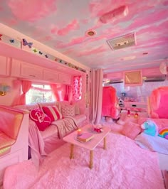 this is a bedroom with pink walls and carpeted flooring that looks like it has been decorated in the style of barbie