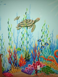 an underwater scene painted on the wall of a children's room