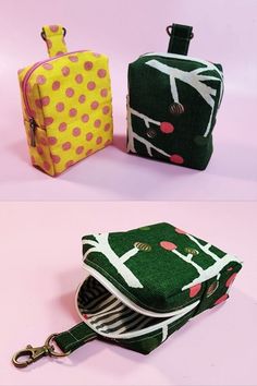 two small zippered pouches are shown side - by - side, one in green and the other in pink