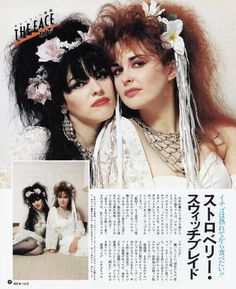 two women with flower crowns on their heads are posing for the camera in front of an article