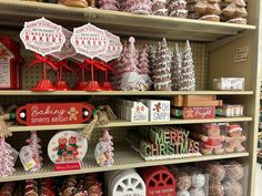 the shelves are filled with christmas decorations and cookies