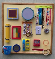 there are many different items on the wall in this case, including scissors and other things