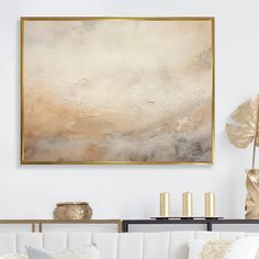 a living room filled with furniture and a painting on the wall