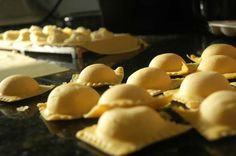 small pastries are lined up on the counter