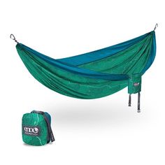 a hammock and backpack set up on a white background