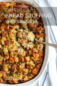 old fashioned bread stuffing with sausage in a casserole dish on a blue and white towel