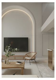 a living room filled with furniture and a flat screen tv mounted to the side of a wall