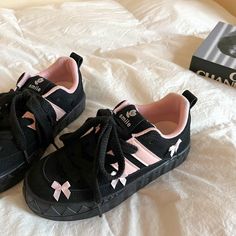 These Blokette Aesthetic Black and Pink Platform Sneakers feature a vegan leather upper with pink stripes, a low ankle rise, lace-up front, and cute pink bows all over. ✨Material: Vegan LeatherRun small, please review the sizing information Pink And Black Sneakers, Pink Lace-up Skate Shoes, Black Low-top Harajuku Skate Shoes, Black Harajuku Low-top Skate Shoes, Harajuku Style Black Low-top Skate Shoes, Casual Pink Lace-up Skate Shoes, Cute Pink Sneakers With Vulcanized Sole, Pink Round Toe Skate Shoes With Laces, Trendy Pink Lace-up Skate Shoes