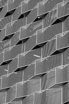 size: 12x8in Photographic Print: Modern Steel Cladding with Angular Geometric Patterns and Square Holes in a Shiny Metal by a40757 : Metal Panels Facade, Angular Architecture, Steel Cladding, Aluminium Cladding, Metal Facade, Facade Cladding, Perforated Metal, Panel Systems, Metal Panels