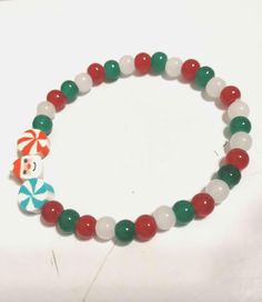 Santa glass beaded bracelet  Super cute  Holiday bracelet  Great condition Holiday Bracelet, Holiday Bracelets, Glass Beaded Bracelet, Glass Beaded Bracelets, Beaded Bracelet, Favorite Jewelry, Beauty Book, Glass Beads, Jewelry Bracelets