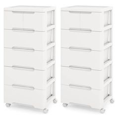 two white drawers sitting next to each other on casteors with wheels in front of them