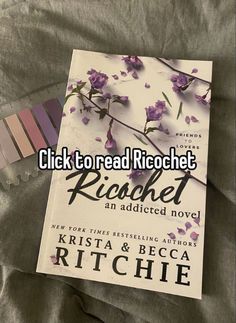 a book sitting on top of a bed next to a striped keychain with the title click to read rechect