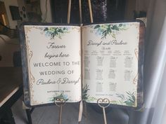 an open wedding program is displayed on a stand