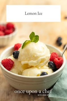 a bowl filled with ice cream and berries