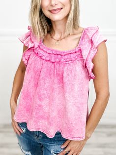 Introducing our Ruffled Washed Knit Sleeveless Top—perfect for adding a touch of playful charm to any outfit! Made from soft, washed knit fabric, this top features darling ruffles and a sleeveless design. It's a must-have for those who don't take themselves too seriously. Fabric content: 100% Rayon Chic Cotton Ruffled Tank Top, Cotton Ruffled Tank Top, Spring Sleeveless Blouse With Ruffle Hem, Cotton Ruffle Hem Sleeveless Tank Top, Chic Cotton Tops With Ruffled Straps, Sleeveless Cotton Tank Top With Ruffle Hem, Pink Sleeveless Top With Ruffles, Casual Cotton Top With Ruffled Straps, Cotton Sleeveless Tank Top With Ruffle Hem