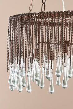 a chandelier with glass drops hanging from it