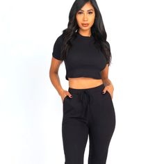 Beautiful New Two Piece Lounge Wear Set. It Is Very Comfortable And Stretches. Can Be Worn To An Outdoor Event Or Relaxing Indoors. My Go To Lounge Wear. Get So Many Compliments.. Top Is Crop You Will Be Happy With How Good It Feels On Your Skin. It's An Absolute Winner!! True To Size Casual Black Two-piece Top, Casual Cropped Sets For Night Out, Black Stretch Two-piece Bottoms, Stretch Black Sets For Workwear, Black Two-piece Set With Short Sleeves, Black Stretch Workwear Sets, Fitted Black Two-piece Top, Black Fitted Two-piece Top, Fitted Two-piece Loungewear Pant Set