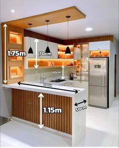 a kitchen with an island, sink and refrigerator in the center is shown for measurements