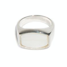 This is our 'Archie' ring from our flat top Thomas collection. With its flat, barrel face adorned with a high polished, 16x12mm white mother of pearl, the 'Archie' ring combines practicality and edge. This unisex signet ring is a go-to piece with endless wearability. White mother of pearl has a tremendous ability to calm and lessen the fears of those who wear it, it is especially helpful for anyone whose life is intense and stressful. White Mother of Pearl No two stones are alike Available in St Top Rings, Birthstone Necklace, White Ring, Signet Ring, Accessories Necklace, Vintage Accessories, Favorite Things Gift, Chains Necklace, Mother Of Pearl