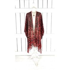 Red Black Sequin Fringe Tassel Kimono Cardigan Cover Up Jacket Measurements...Taken Flat -Size: One Size -Across Width Seam To Seam: 46" -Length With Fringe: 35" Features - Lightweight Sheer Black Net -Accented With Red Sequin -Scalloped Edges -Fringe Hem -Bohemian Gypsy Oversized Flowing Style -Generous Arm Holes Red Long Sleeve Cardigan For Festivals, Red Long Sleeve Sequined Outerwear, Red Sequined Outerwear For Party, Red Fringe Shawl For Fall, Red Fringed Shawl For Fall, Red Festive Outerwear For Fall, Red Long Sleeve Cardigan For Party, Red Long Sleeve Party Cardigan, Party Outerwear With Tassels