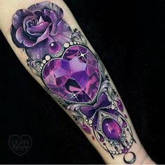 a purple tattoo with a rose on it