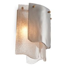 a light that is on the side of a wall mounted fixture with a glass shade