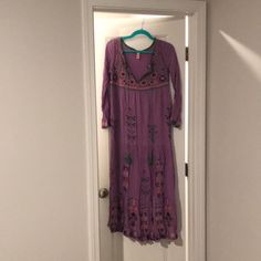 Nwot. Never Worn. Beautiful Light Purple Dress With Tribal Print As Pictured. Tassel Tie In Front. There Is No Tag Indicating The Fabric But I Think There Is Definitely Rayon. Long Casual Purple Dress, Spring Purple Long Maxi Dress, Purple Long Maxi Dress For Spring, Casual Long Purple Dress, Purple Long Sleeve Maxi Dress For Beach, Purple Bohemian Spring Maxi Dress, Bohemian Purple Spring Maxi Dress, Bohemian Purple Maxi Dress For Spring, Lavender Long Sleeve Maxi Dress For Summer