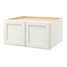 a white cabinet with two doors and one drawer on the bottom, in front of a white background