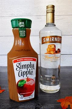 a bottle of smirnol next to an apple cider