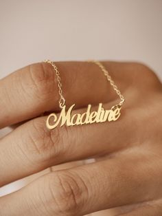 Imagine a necklace that holds a special place in your heart. Our personalized 14k gold name necklace offers a unique and meaningful way to express your love and affection. This exquisite piece, adorned with your chosen name, is a testament to the bond you share with a loved one. Whether it's a gift for your wife or a cherished keepsake for yourself, this personalized necklace is a symbol of enduring love and connection. Features and Benefits ✅ Customizable with your desired name ✅ Crafted from h Customizable Pendant Necklaces For Anniversary, Customizable Pendant Necklace For Anniversary, Personalized Yellow Gold Necklaces For Anniversary, Elegant Customized Necklaces For Anniversary Gift, Elegant Customized Necklace For Anniversary Gift, Elegant Customizable Necklace For Anniversary Gift, Personalized Yellow Gold Necklace For Anniversary, Elegant Customizable Necklace For Anniversary, Name Heart Pendant Necklaces For Anniversary Gift