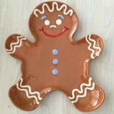 a cookie shaped like a ginger on a table