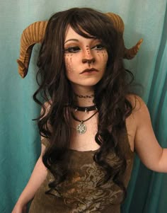 45+ amazing halloween costume ideas Horn Costume Women, Horned Halloween Costume, Ram Costume Women, Mythical Creatures Halloween Costumes, Halloween Costumes For Long Brown Hair, Diy Ram Horns, Mystical Costume Ideas, Long Brown Hair Halloween Costume Ideas, Witch Cosplay Ideas