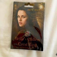 a card with the cover of a novel called bella's fallen crest ring on it