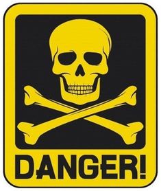 a yellow danger sign with a skull and crossbones on it stock photo - 719