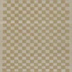 a beige and white rug with squares on it