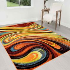 a colorful area rug in the middle of a room