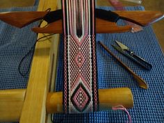 a weaving machine with several different types of items on it