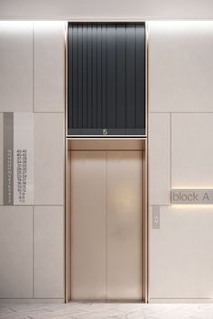 an elevator with the doors closed in front of a sign that reads black and white