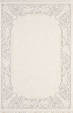 a white and grey rug with an ornate border